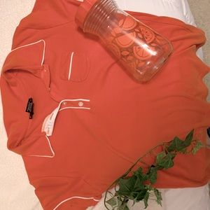 Orange retro mechanic shirt.